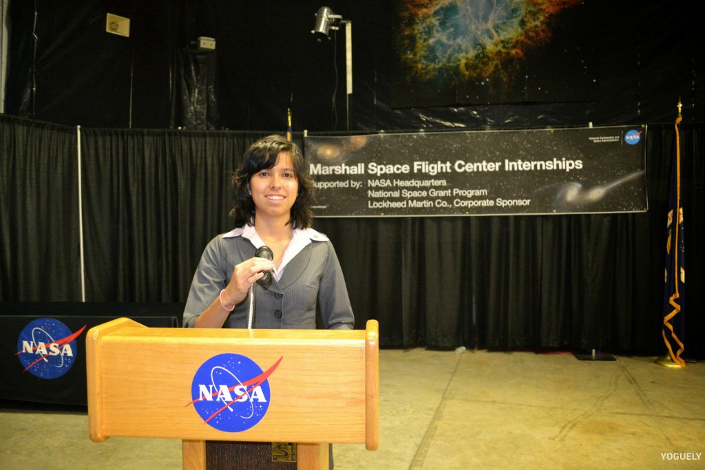 Aida Yoguely working at the NASA Marshall Space Flight Center.